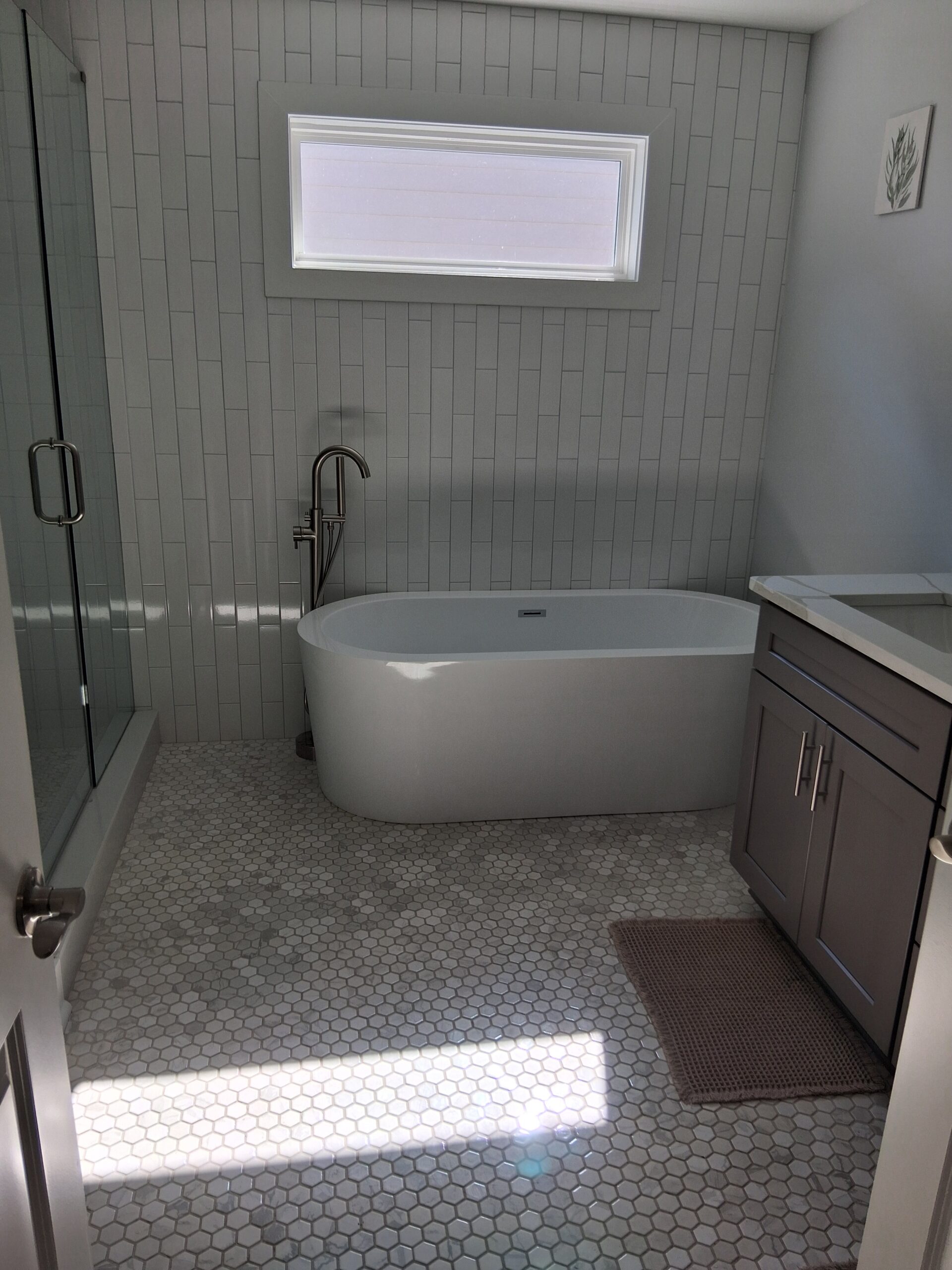 Professional recurring cleaning by Mkleaning in a beautifully maintained high-end bathroom with skylight in Sandy Springs.