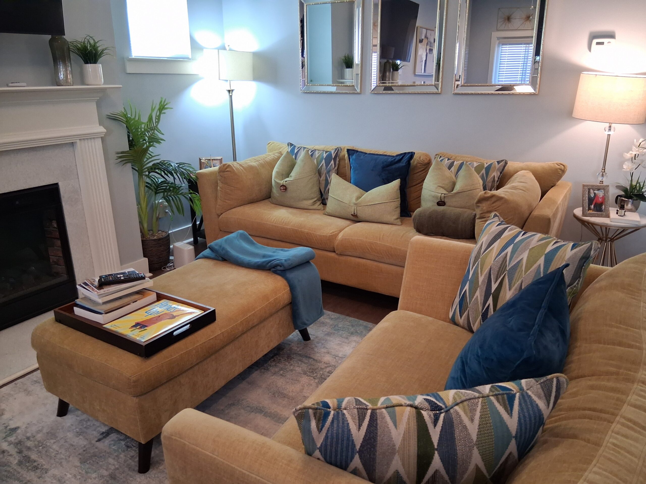 Professional recurring cleaning by Mkleaning in a beautifully maintained high-end TV room with attention to decoration and neatly arranged cushions in Alpharetta