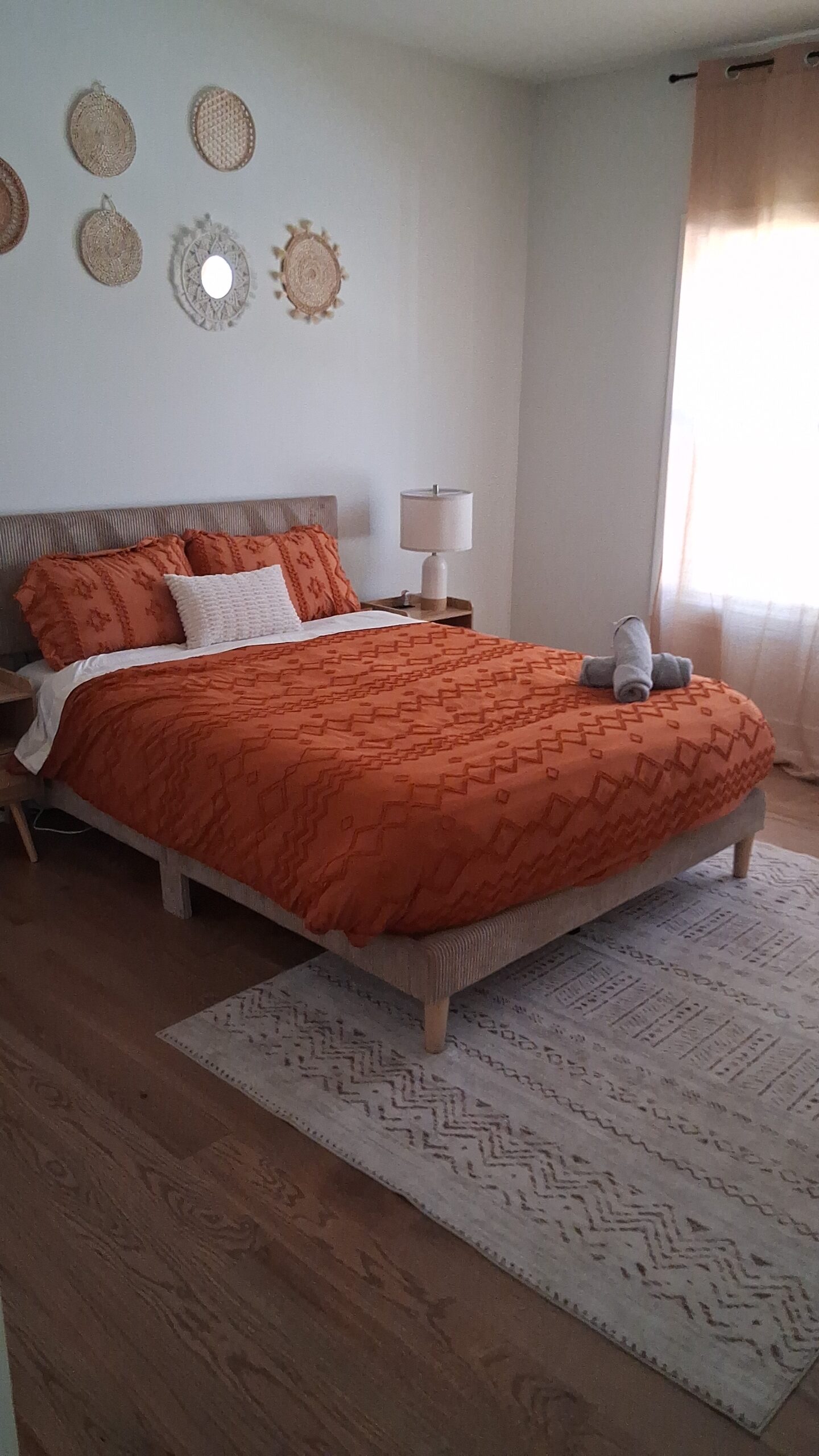 Professional recurring cleaning by Mkleaning in a beautifully maintained high-end bedroom with neatly made bed and hotel-style details in Roswell.
