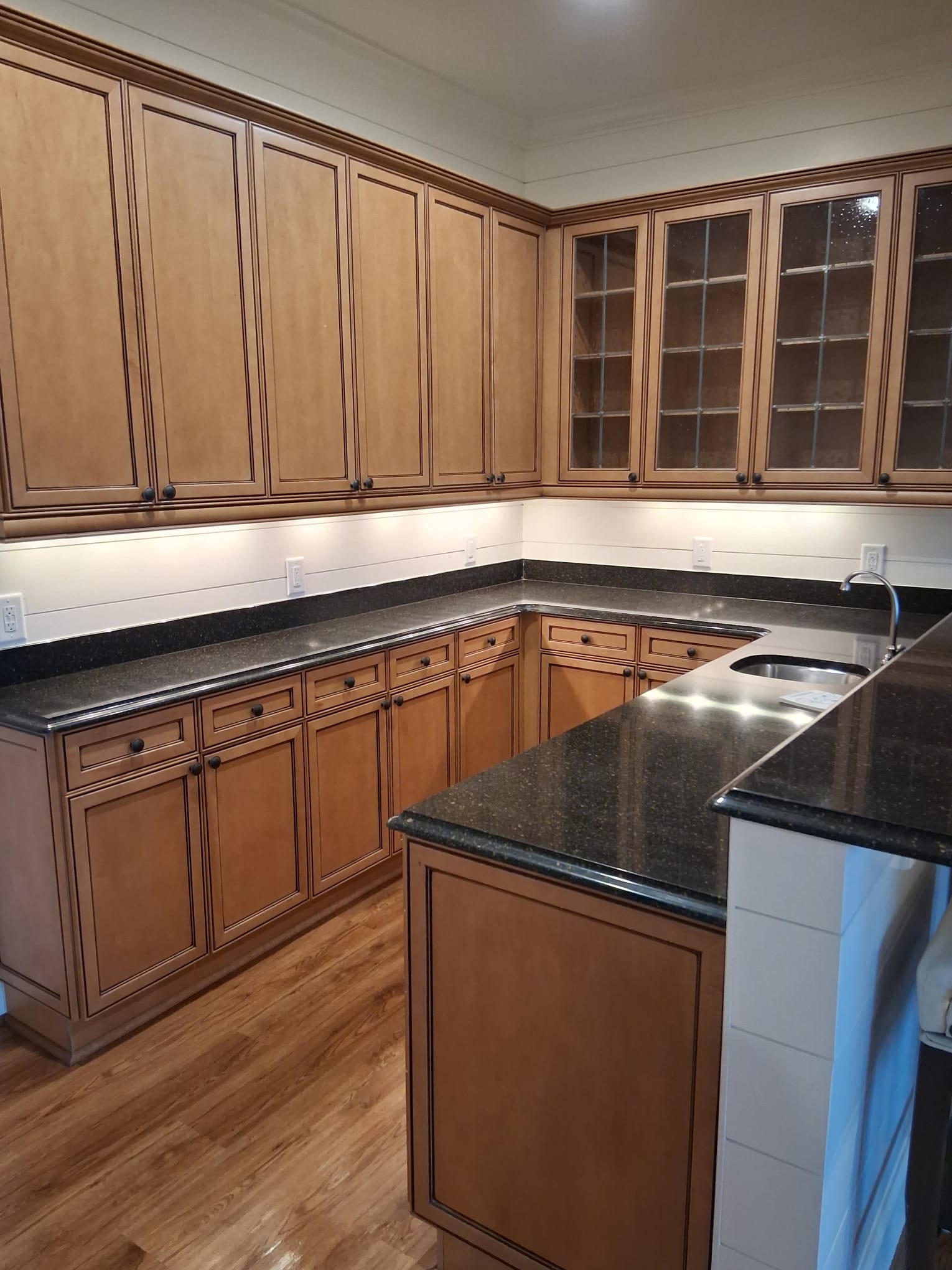 Professional move-in kitchen cleaning with spotless cabinets, countertops, and polished floors