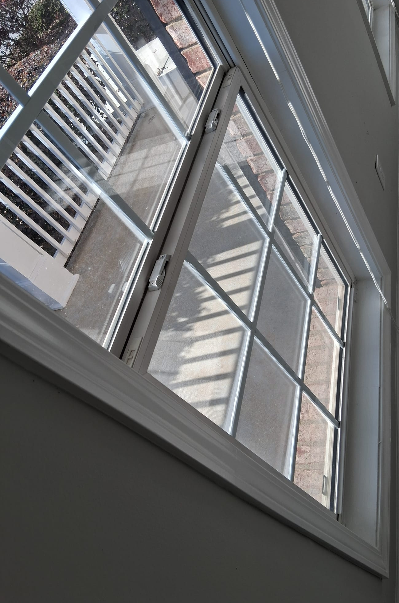 Professional interior window cleaning with detailed glass and frame cleaning for streak-free results