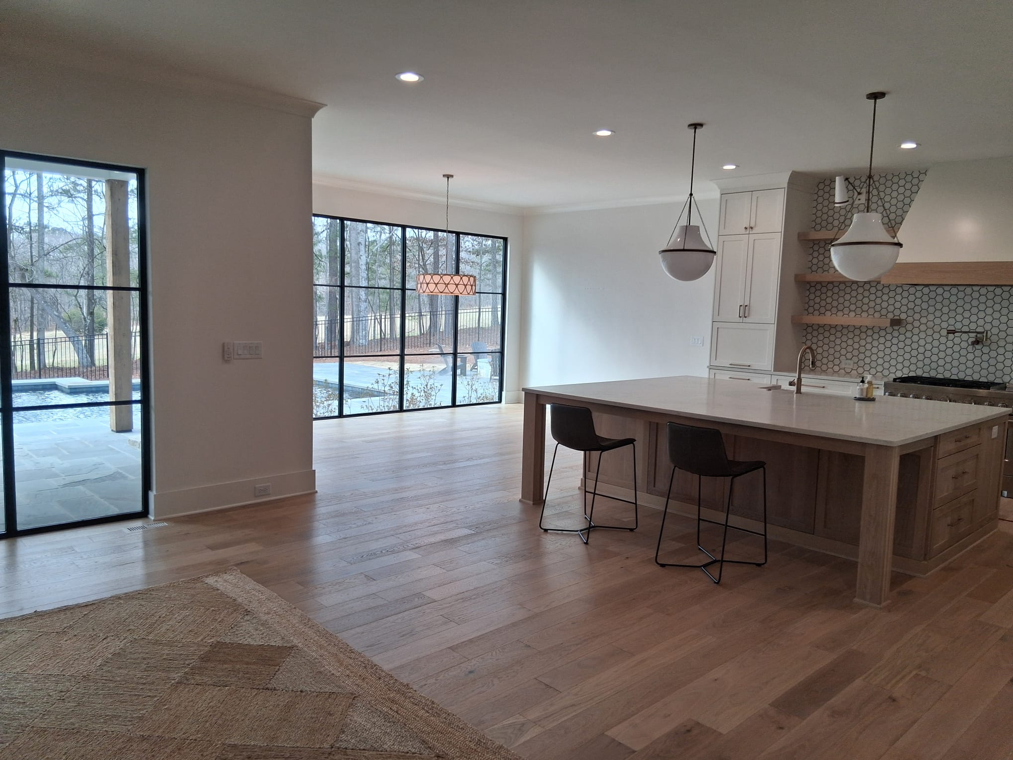 Move-out cleaning of kitchen and dining area with detailed floor, countertops, and open space cleaning