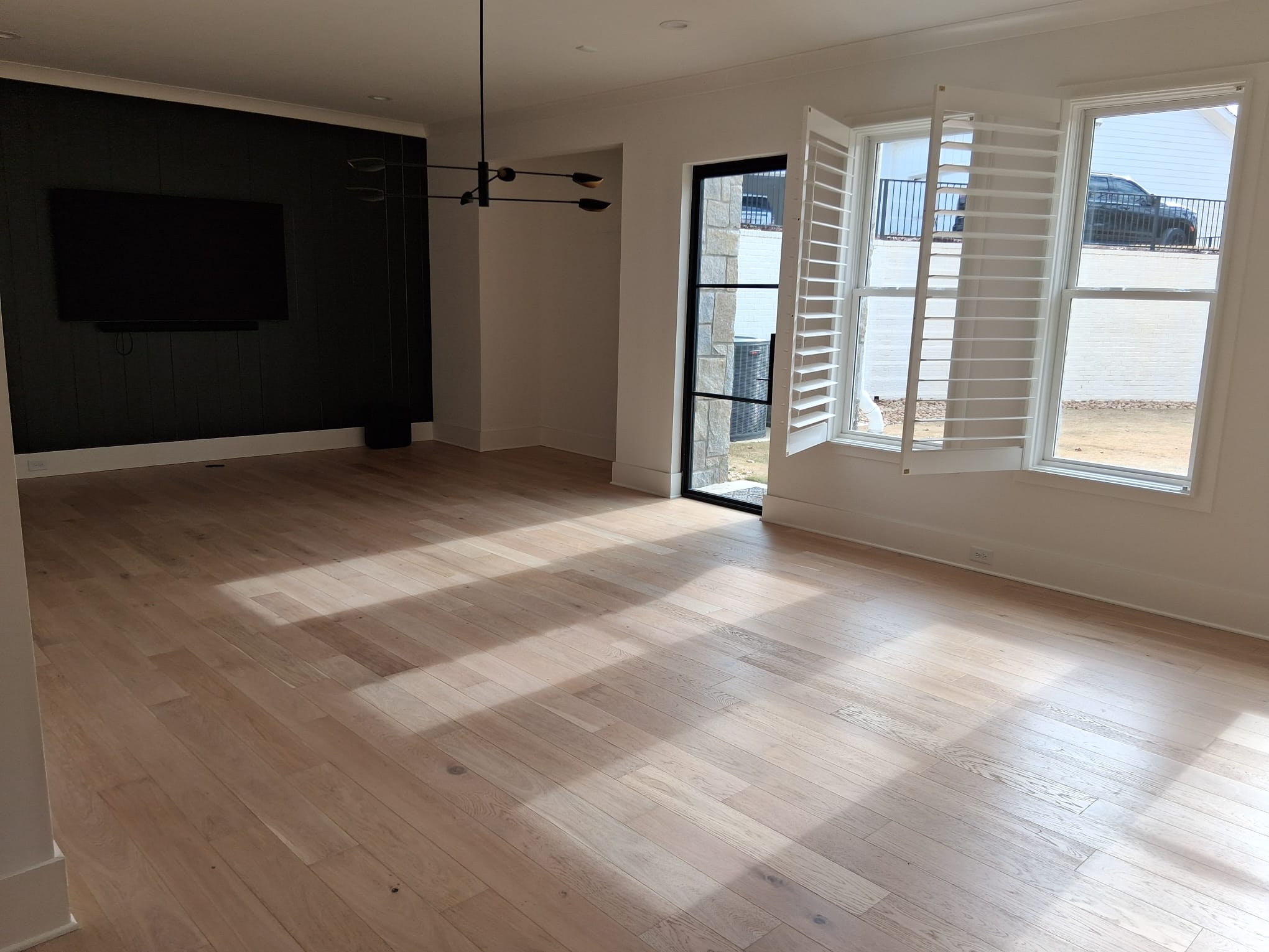 Professional move-in cleaning in a basement living room preparing the space for a fresh and ready-to-use home