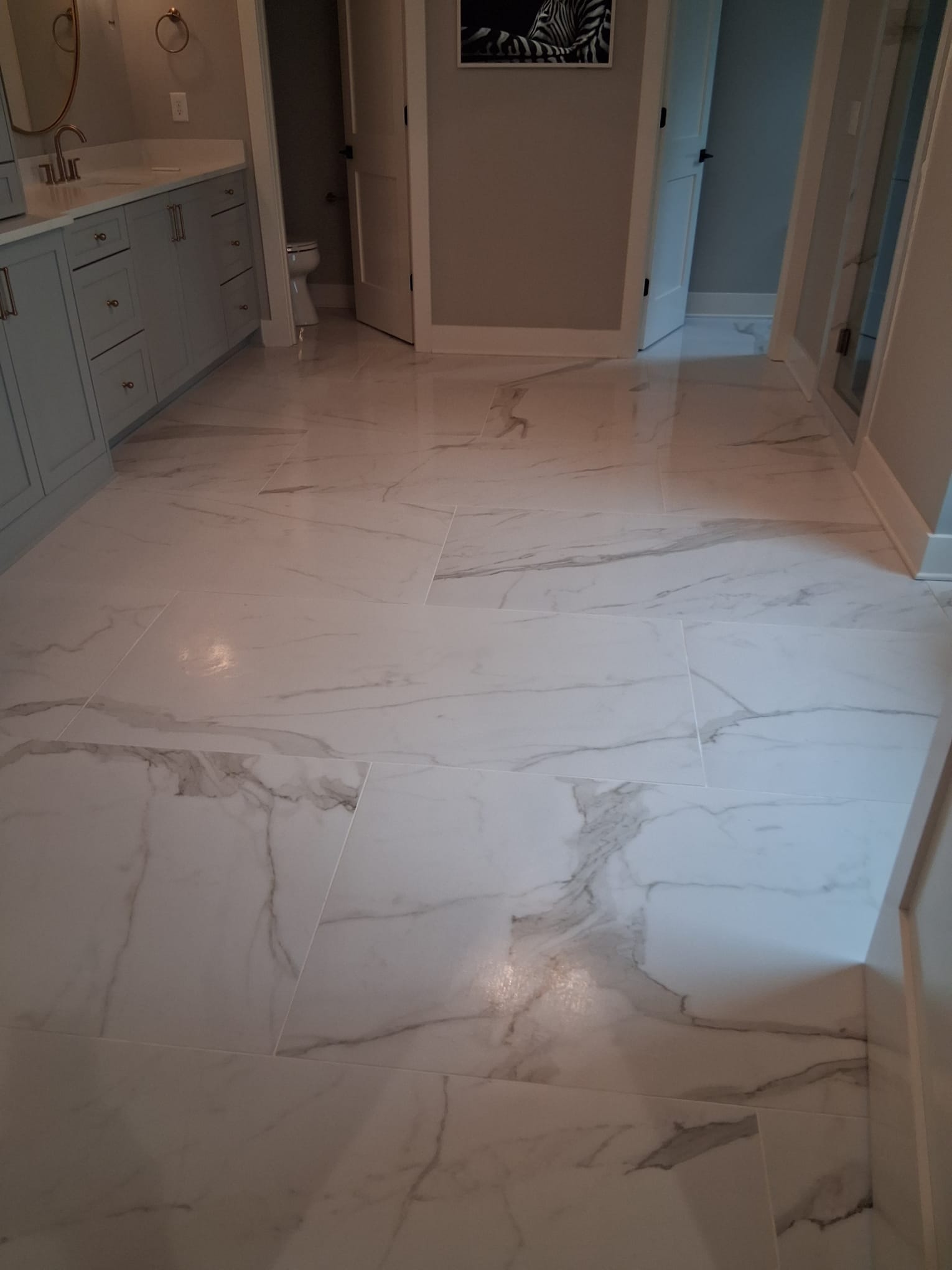 Move-out cleaning with special attention to porcelain tile flooring, removing dust, residue, and restoring shine