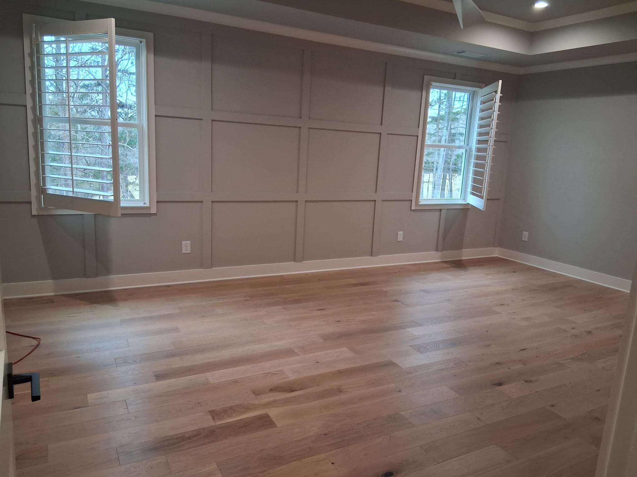 Professional move-in master bedroom cleaning with spotless floors and refreshed surfaces ready for immediate use